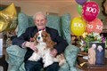 Former Navy chief recalls surviving Nazi raid as he celebrates 100th birthday