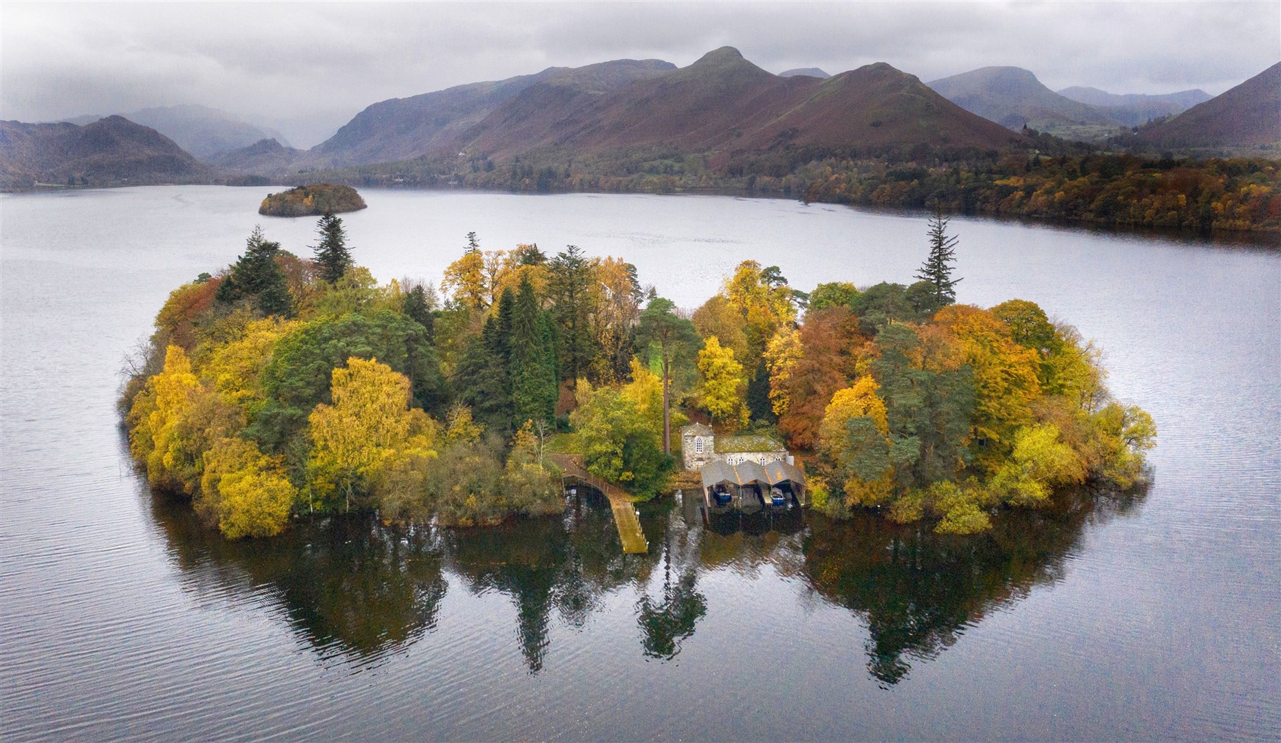 Aerial view of autumn colours on Derwent Isle on Derwentwater near Keswick in the Lake District (Owen Humphreys/PA)