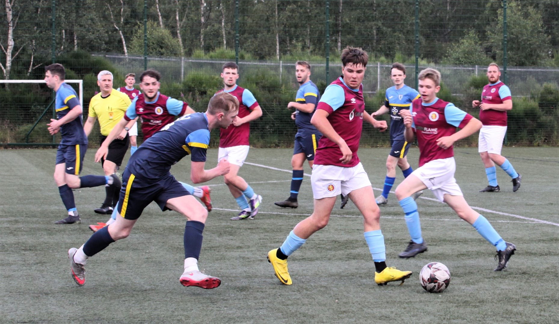 A busy looking midfield during the cup final clash between Grantown United and Cromdale. Picture: Frances Porter.