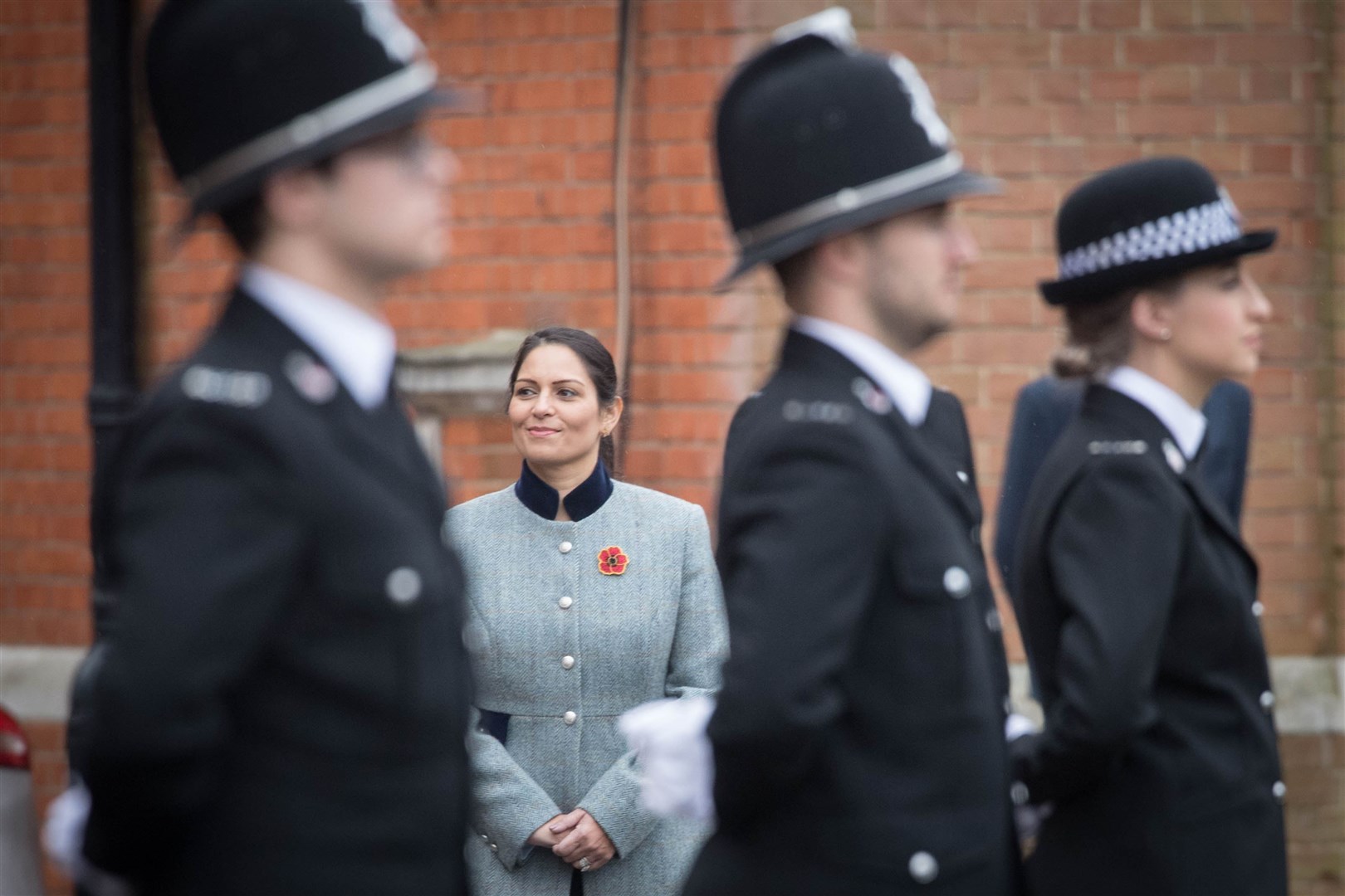 Home Secretary Priti Patel inspects new police recruits (Stefan Rousseau/PA)