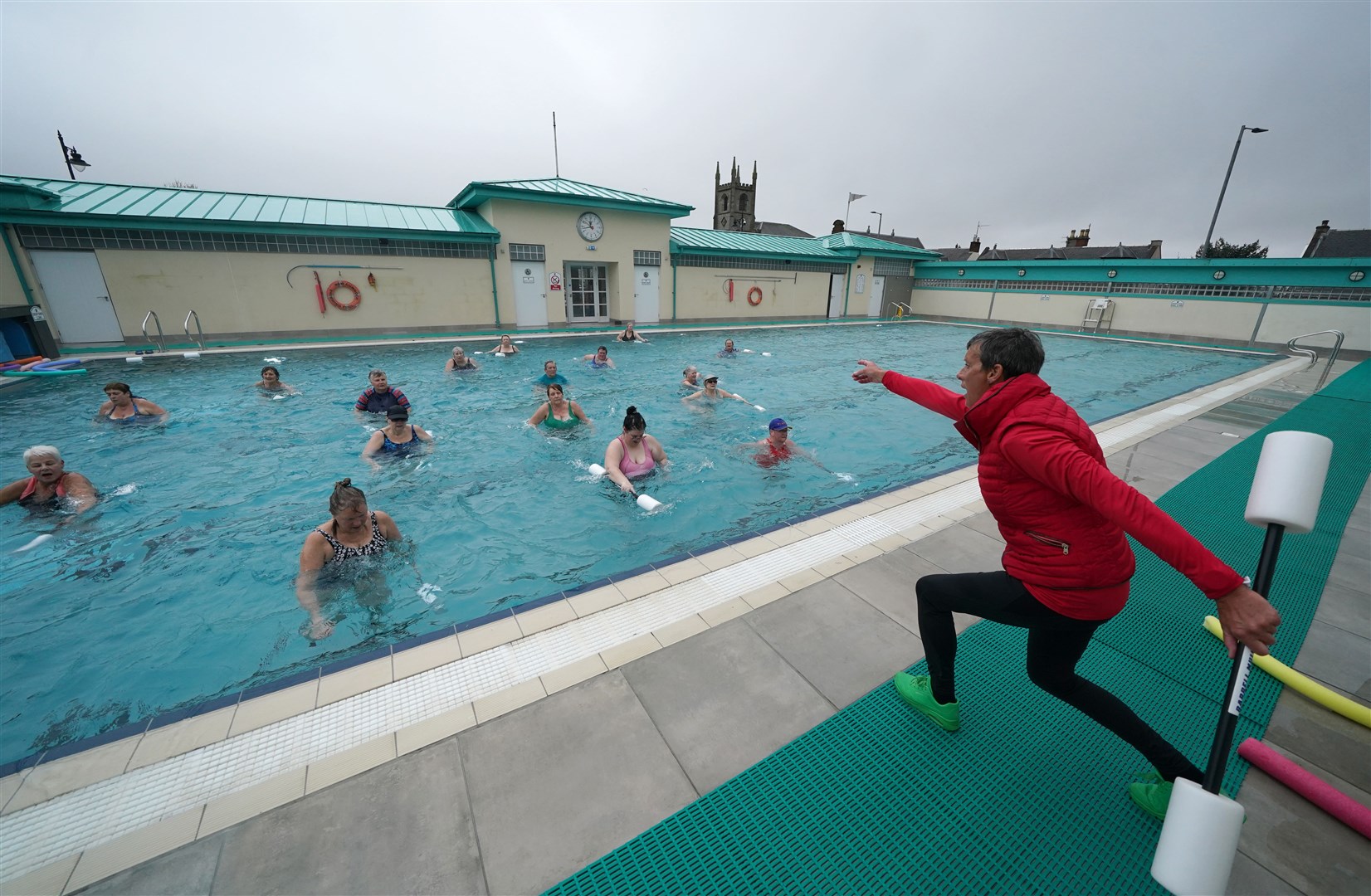 The reopening attracted numerous swimmers (Andrew Milligan/PA)