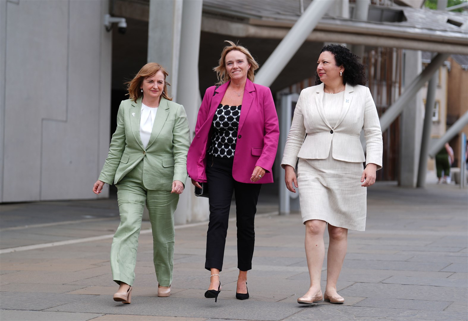 Nurse Sandie Peggie (centre) alongside her solicitor Margaret Gribbon (left) and Sex Matters CEO Maya Forstater (right) outside the Scottish Parliament (Andrew Milligan/PA)
