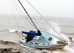 A yacht is blown ashore at Fortrose on the Black Isle