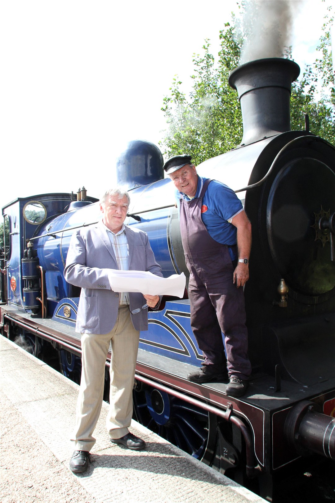 Strathspey Railway Charitable Trust representative Andrew McCracken and steam loco driver Doug Scott.