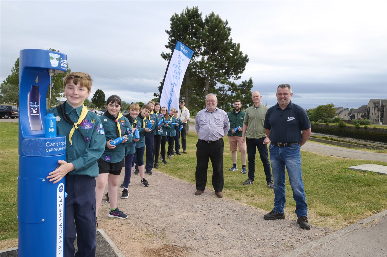 Scouts celebrate the Top Up Tap at Nairn.