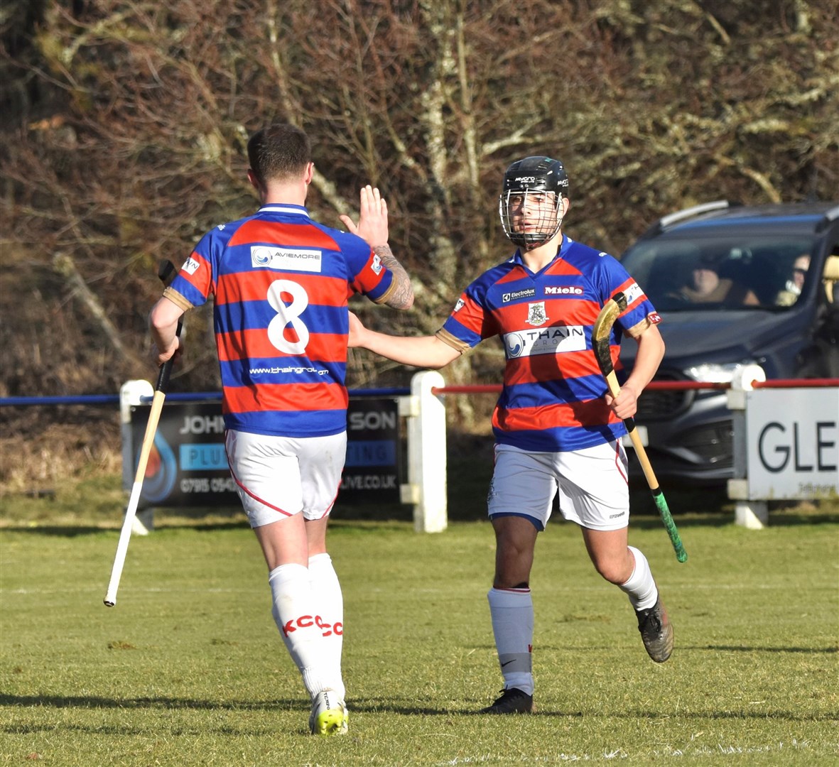 Thomas Borthwick congratulating Eoin Baikie (right) on one of his two goals. Picture: Fiona Young.