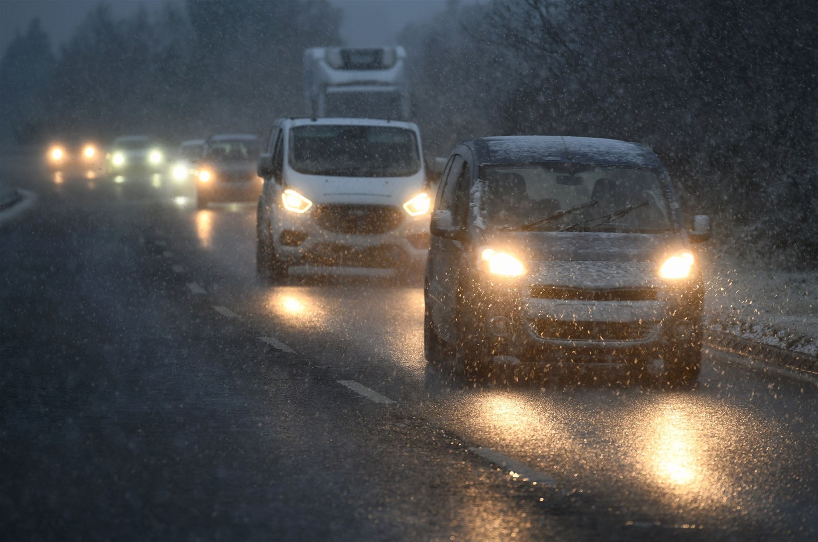 Traffic driving in this week’s snow. Picture: James Mackenzie