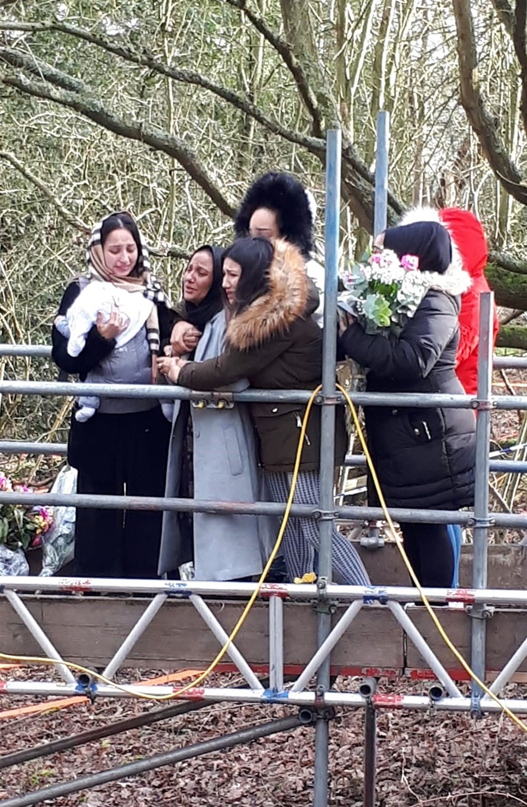 The family of Mohammed Shah Subhani visit the site in Buckinghamshire where his remains were found by police (Metropolitan Police/PA)