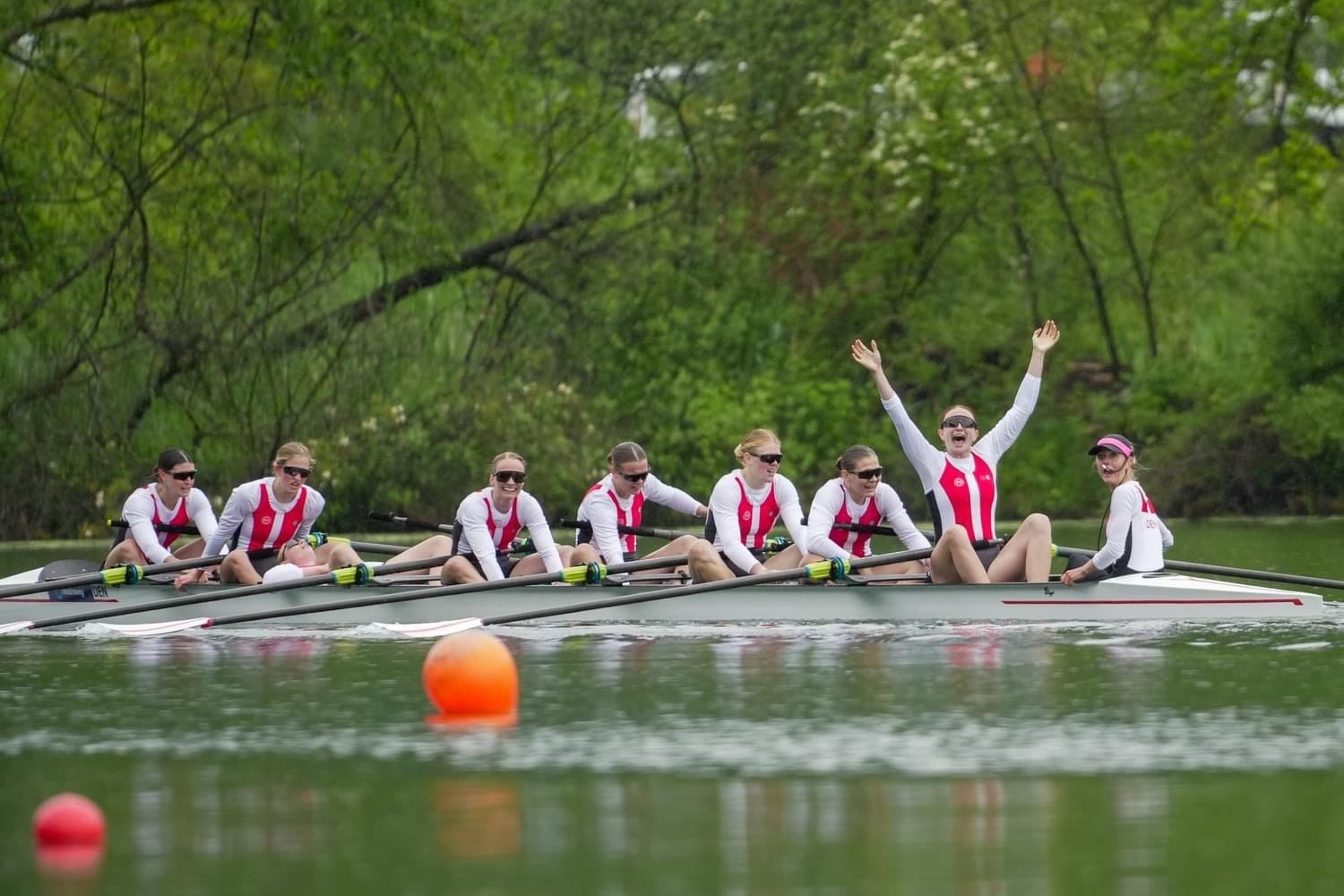 Nikoline Laidlaw (second right) celebrates earning a spot at the 2024 Olympic Games with the Denmark rowing team.