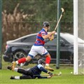 Kingussie's Eoin Baikie watches the ball cross the line for his goal. Picture: Neil Paterson.