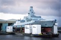 Kate names Royal Navy warship by smashing bottle of whisky against hull