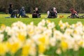 Public urged to socialise outside, keep their distance and ‘hug cautiously’