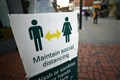 Social distancing and face masks for ‘foreseeable future’ despite vaccine