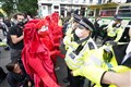 XR occupies two central London bridges during second week of climate protests