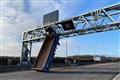 Motorway closed after truck hits overhead gantry