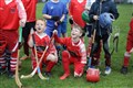 Gaelic Medium shinty Coaching Session taking place prior to the men and women's Mod Shinty Cup matches at Bught Park Inverness at The Royal National Mòd 2021 in Inverness, Scotland