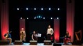 Glenfinnan Ceilidh Band perform on stage awith special guest Gaelic singer, Margaret Stewart Eden Court Theatre on the openng night of live music, The Royal National Mòd 2021