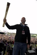 Rockness 2012 on Saturday afternoon the Olympic torch dropped in, held here by one of the festival promoters Jim King. Picture: Callum Mackay