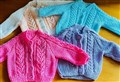 Staff and prisoners at HMP Inverness knit handmade hats, scarves, and cardigans for newborn babies