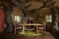The simple dining room table and two chairs at Shrek's swamp hideaway.