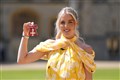 William tells Olympian that Charlotte a keen runner during investiture ceremony