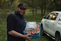 RZSS invertebrate keeper Adam Button at the Dark Bordered Beauty Moth release in the strath. Picture: RZSS.