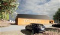 An artist's impression of the new visitor centre and landscape around it.