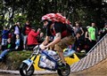 A daredevil takes off on a mini-moto (Olly Bowman)
