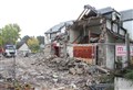 Demolition work is continuing at Scotland's first ski hotel
