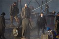 Michael Gray (pictured centre right), played by Finn Cole, is involved with the final days filming at Portsoy as the cast and crew film on the new harbour. ..Picture: Daniel Forsyth..