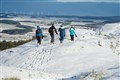 In Pictures: Britons brave the elements to enjoy winter walks