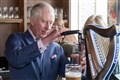 Charles pulls a pint of Guinness as he celebrates ahead of St Patrick’s Day