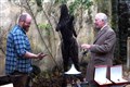 Hands off! Charles declines traditional greeting with dusty blacksmith