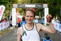 The mens winner was happy with his medal. Picture: James Mackenzie.