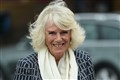 Camilla meets dogs being trained to detect Covid-19