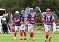 Ruaridh Anderson being congratulated by James Falconer, Calum MacKintosh and Savio Genini. Picture: Fiona Young.