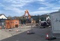 Fire-hit retail units demolished as police inquiries continue