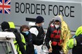 UK and France sign agreement to curb migrant crossings in English Channel