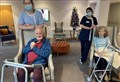 WATCH: Grantown school band braves cold to bring joy to care home