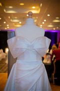 Show off those shoulders in this gown complete with large bow effect. Picture: Callum Mackay.