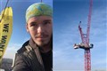 Norwich crane climber ‘cold but in good health’ 24 hours into climate protest