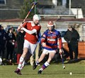 Pete Dickson gets to the ball ahead of Bobby Russell.