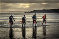 Swimmers brave the sea for icy annual New Year’s Day dip