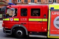 Murder arrest after three children and woman die in house fire