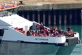 Dozens of migrants brought ashore at Dover by Border Force
