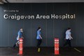 Foster defends relaxations as NI hospitals struggle with surging admissions