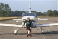 Kickboxer attempts marathon pulling a plane