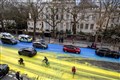 Four arrests after campaigners paint Ukrainian flag outside Russian embassy