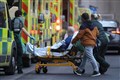NHS under ‘significant pressure’ with record 32,000 coronavirus patients