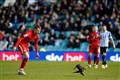 Cat ‘safe and sound’ after pitch invasion during League One football match